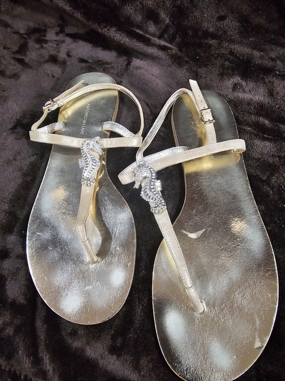 ANTONIO MELANI Metallic Silver T-Strap Sandals with Crystal Seahorse Accent